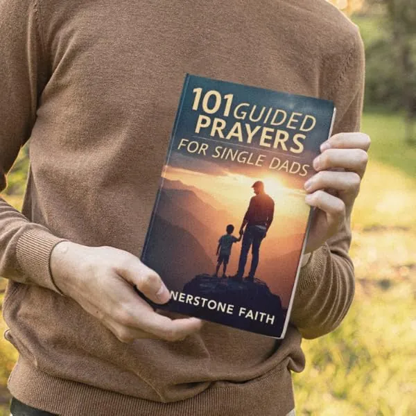 A man holding the open book